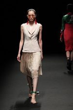 GRANDI Tokyo Fashion Week champagne vest pleated skirt Black iris lenses